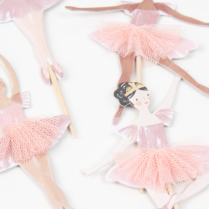 Ballet-themed paper dolls with pink tutus on a white background