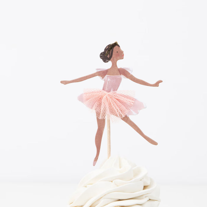 Ballerina figurine on a white background