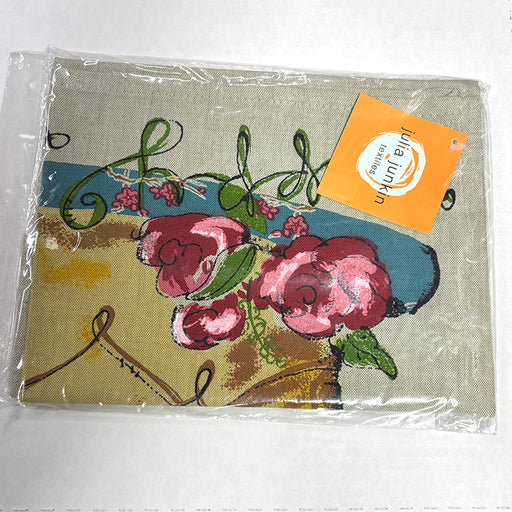 Floral design product in packaging with a visible brand tag on a white background