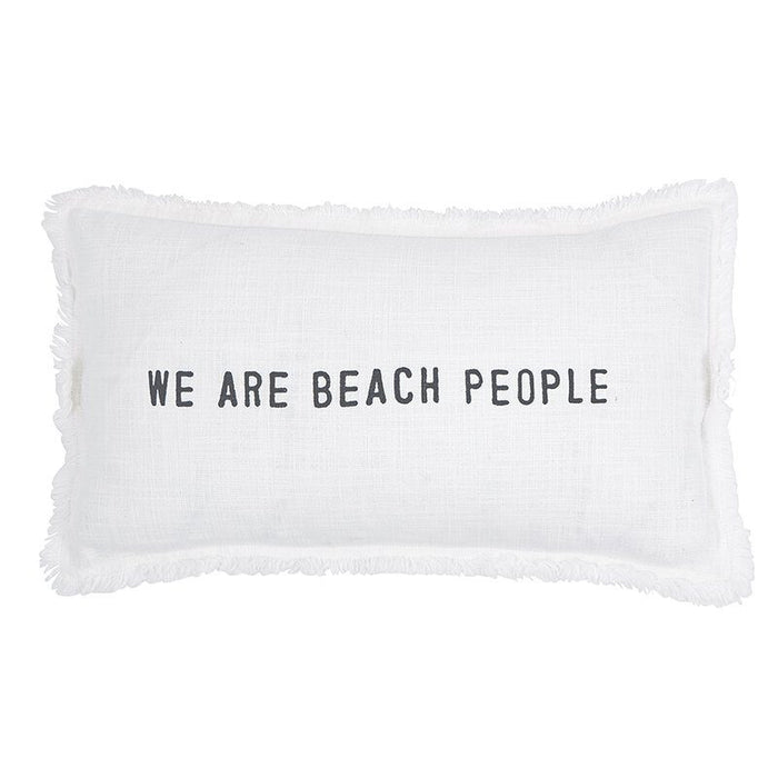 A white rectangular decorative pillow with fringed edges featuring the phrase 'We Are Beach People' in charcoal grey text.