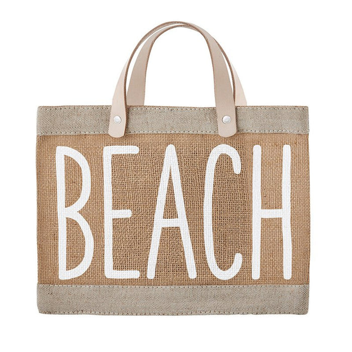 Tote bag with 'BEACH' text on a white background