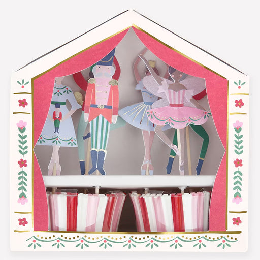 Decorative box with Nutcracker-themed cupcake toppers on a white background