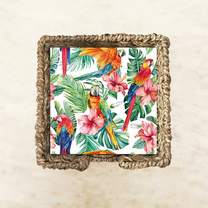 Decorative wall art with parrots and tropical leaves in a woven frame.