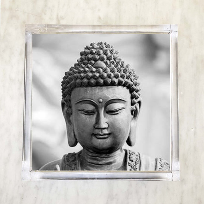 Printed napkin featuring a serene Buddha head design in black and white, perfect for adding a spiritual touch to table decor