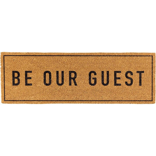 Doormat with 'Be Our Guest' text on a white background