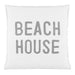 White pillow with 'BEACH HOUSE' text in gray on a white background