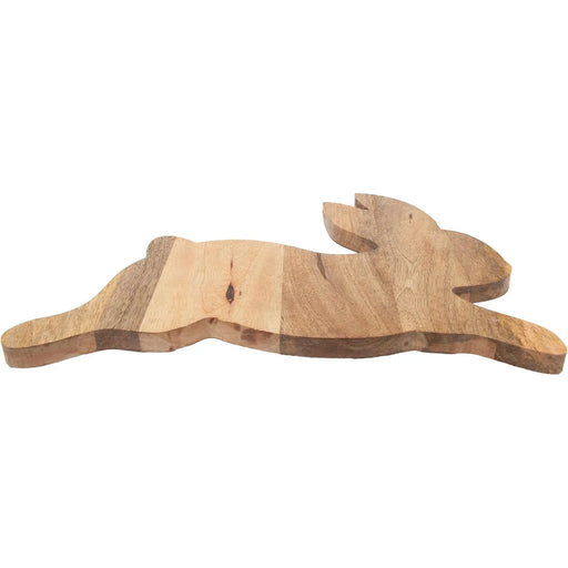 Wooden cutting board shaped like a bunny on a white background