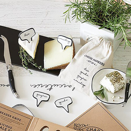 Ceramic Cheese Markers set of 4 — speech bubble shaped ceramic markers labeled Brie, Manchego, Gouda, and Gruyere in black and white