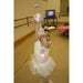 Young girl holding a handmade silver glitter ballerina trophy with pink tulle dress — dance recital keepsake gift