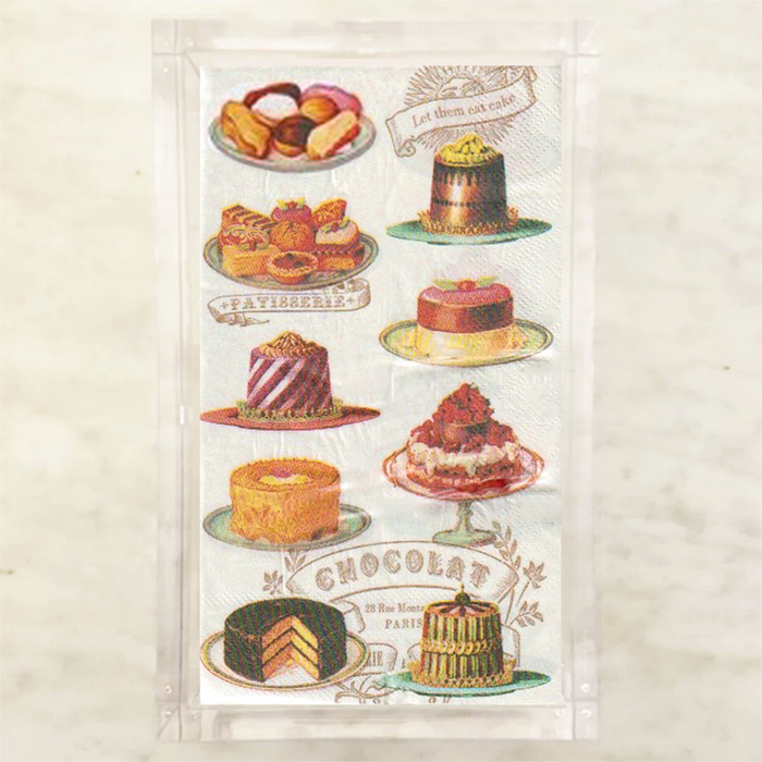 Tea towel with illustrations of various pastries and chocolate desserts on a white background.