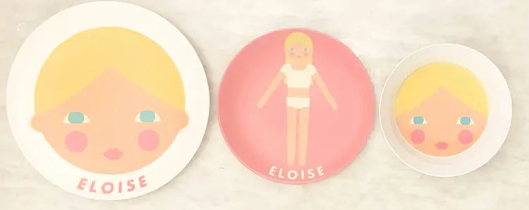 Eloise personalized melamine plates in three sizes showing face plate, full body plate, and small plate
