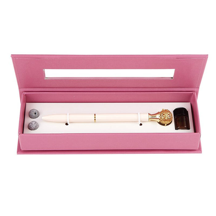Makeup brush set with pink case on white background