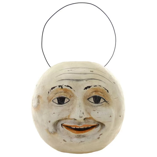 Vintage-style cream paper mâché moon face candy bucket with wire handle