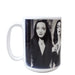 White ceramic coffee mug featuring black and white vintage Morticia Addams imagery — a bold Halloween and goth pop culture gift for horror and Addams Family fans