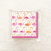 Flamingo print paper napkins featuring a whimsical pattern of pink and orange flamingos on a white background, with a pink border. Perfect for tropical-themed parties, summer events, and celebrations