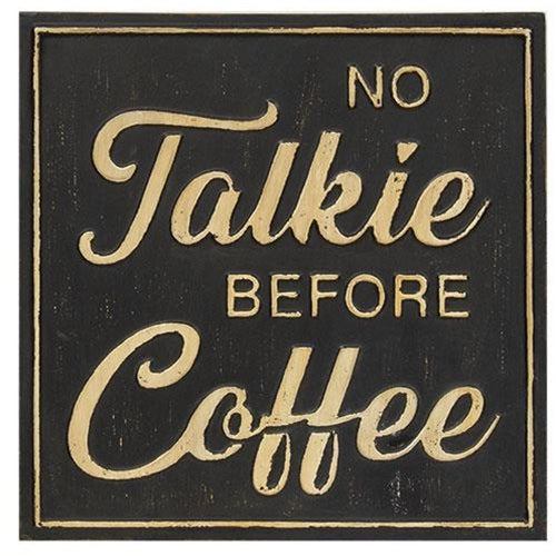 Decorative sign with gold text 'No Talkie Before Coffee' on a black background