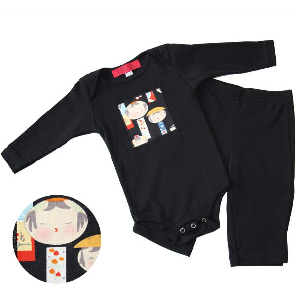 A black onesie with a patch of Geisha dolls on the front and matching black karate pants for babies.