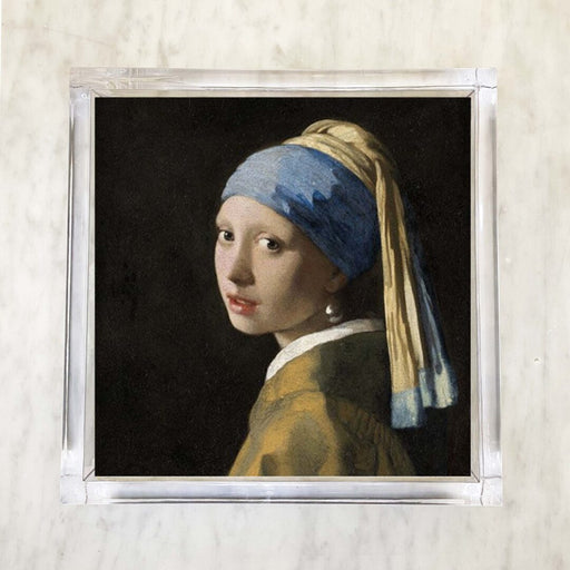 Packaged luncheon paper napkins with the printed image of 'Girl With The Pearl Earring' artwork.