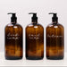 Three amber glass bottles labeled 'dish soap', 'hand soap', and 'lotion' on a white background.