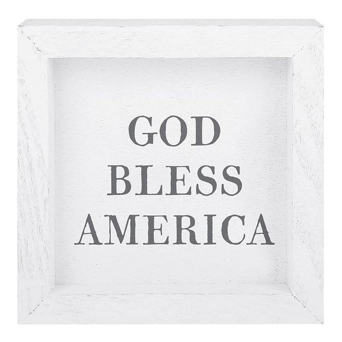 White framed sign with 'God Bless America' text on a white background