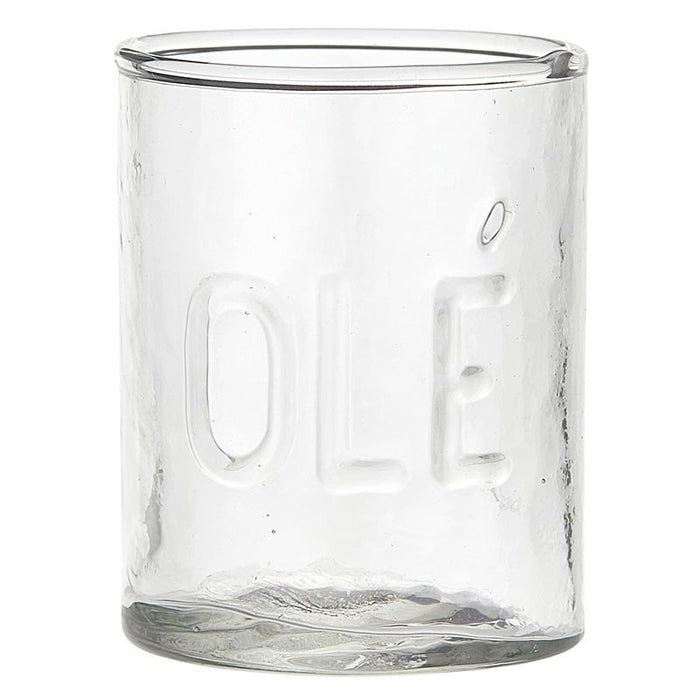 Clear glass jar with embossed design on a white background