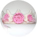 Pink and cream princess crochet wool crown with floral details and ribbon ties for little girls