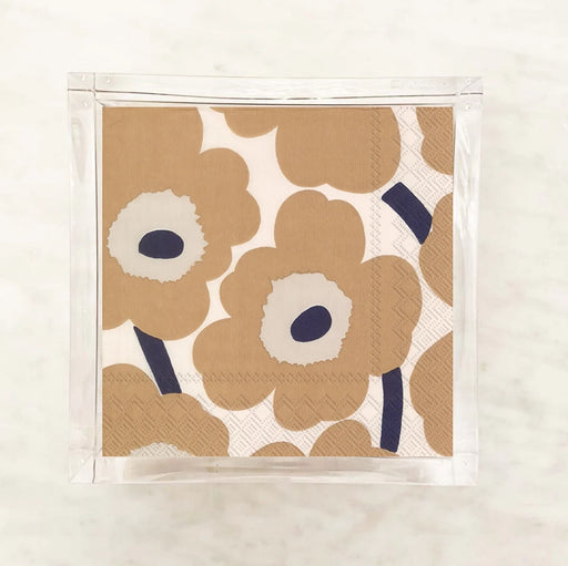 Marimekko Unikko poppy floral luncheon napkins in tan and navy — iconic Finnish design for stylish entertaining, dinner parties, and hostess gifts