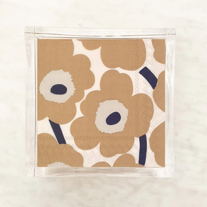 Marimekko Unikko poppy floral luncheon napkins in tan and navy — iconic Finnish design for stylish entertaining, dinner parties, and hostess gifts