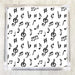 Sheet of music notes and symbols on white napkin