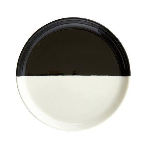 Black and white dipped ceramic plate with a minimalist design, featuring a clean contrast between the two colors.