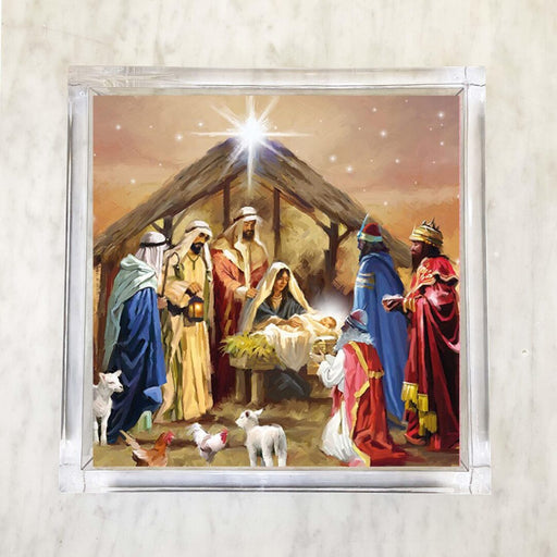 Nativity Scene Luncheon Napkin featuring the Holy Family, Wise Men, and animals in a stable with a starry sky background.