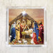 Nativity Scene Luncheon Napkin featuring the Holy Family, Wise Men, and animals in a stable with a starry sky background.