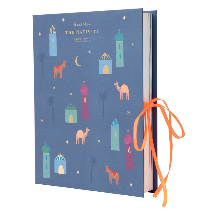 Advent calendar with nativity scene illustrations on a blue background