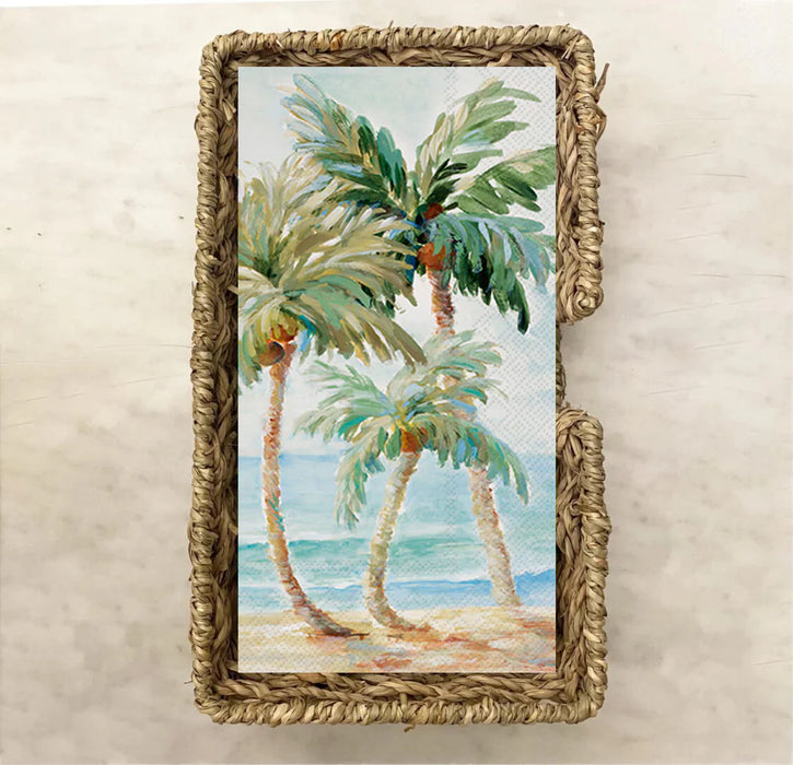 Palms in Paradise guest paper towels featuring a watercolor tropical palm tree and ocean scene in a woven rope frame — perfect for beach houses, powder rooms, and coastal entertaining