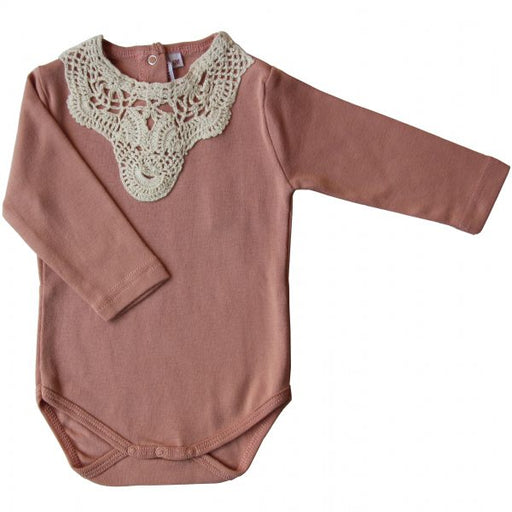 A pink crochet lace onesie for babies.