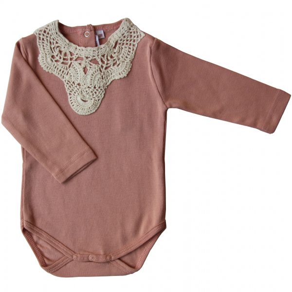 A pink crochet lace onesie for babies.