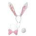 Pink bunny ears with sequins and a bow tie on a white background