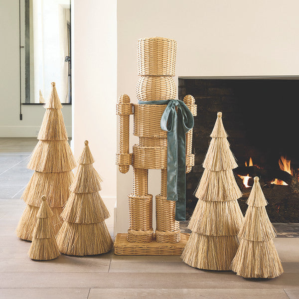 All Weather Rattan Nutcracker with Green Velvet Bow