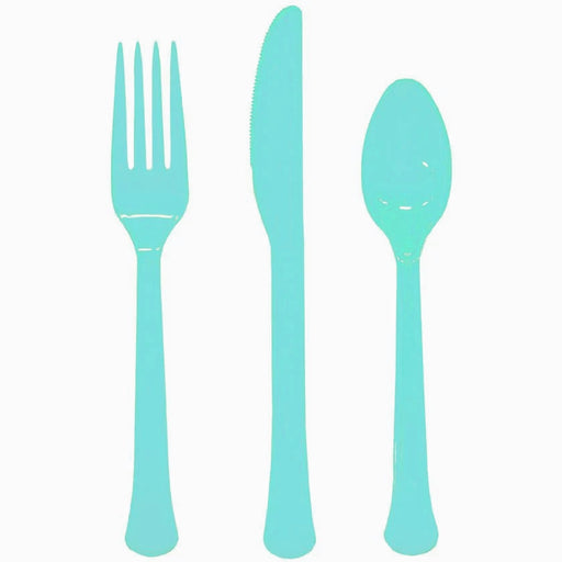 Set of turquoise plastic cutlery including a fork, knife, and spoon on a white background