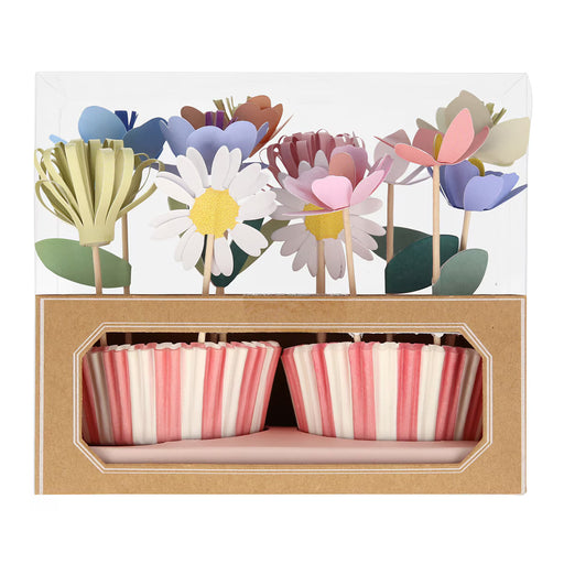 Set of floral cake toppers with striped cupcake liners in a box