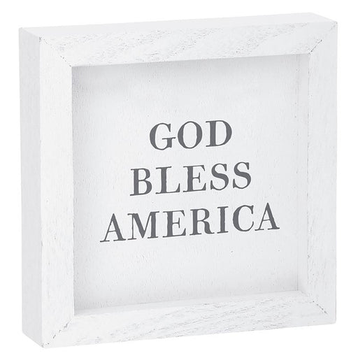 White framed sign with 'GOD BLESS AMERICA' text on a white background