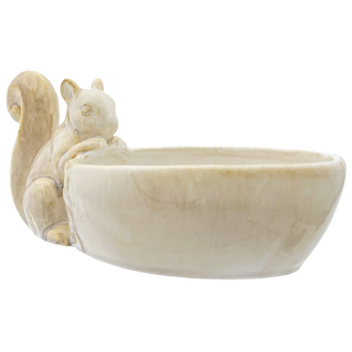 A ceramic squirrel-shaped bowl in a warm cream or ivory glaze.