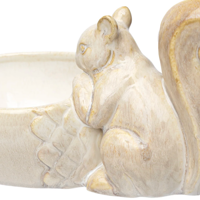 Close-up of a ceramic squirrel candy bowl