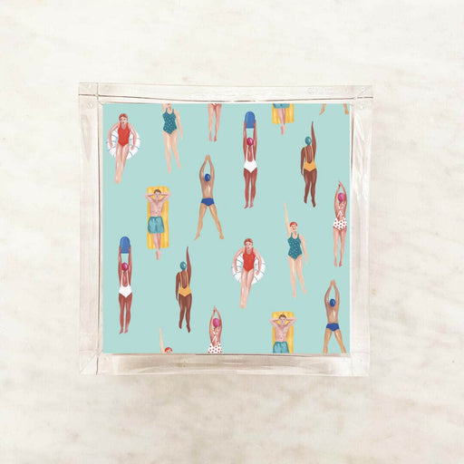 Printed paper napkin featuring a playful pattern of colorful swimmers in various poses on a turquoise background, perfect for pool parties, beach events, and summer gatherings