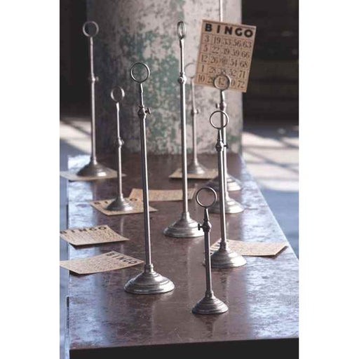 A telescoping picture stand in silver