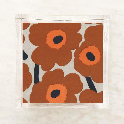 Fabric swatch with orange floral pattern on a beige background
