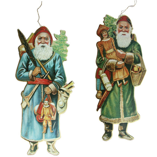 A set of three vintage-style Santa ornaments, each with a different color scheme and carrying a bag of toys, made of heavy cardboard with gold trim.