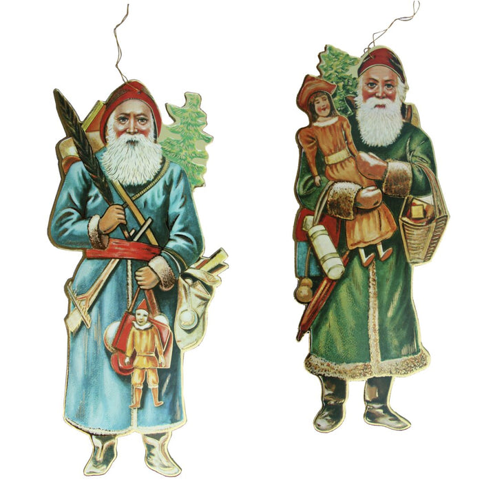 A set of three vintage-style Santa ornaments, each with a different color scheme and carrying a bag of toys, made of heavy cardboard with gold trim.