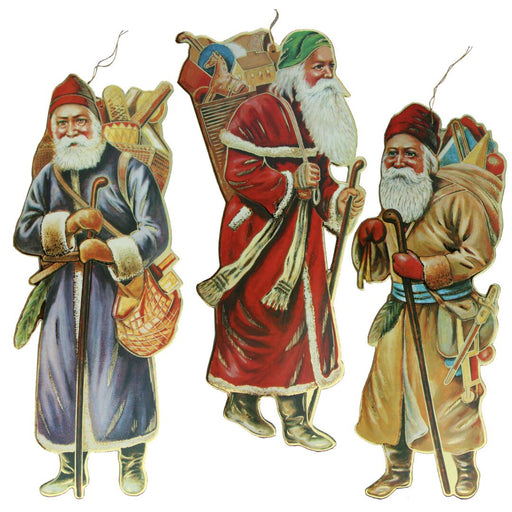 A set of three vintage-style Santa ornaments, each with a different color scheme and carrying a bag of toys, made of heavy cardboard with gold trim.
