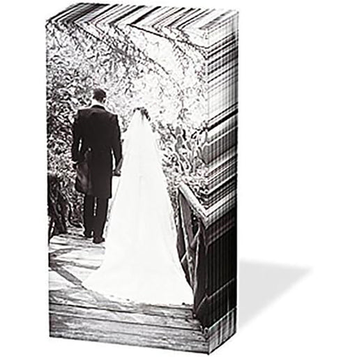 Tissue print with a black and white photo of a bride and groom walking together.